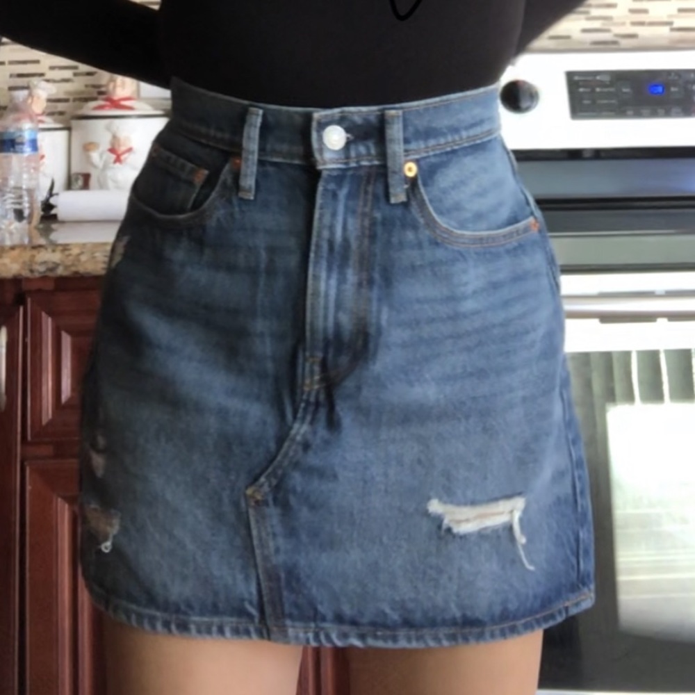 Levi’s dark wash denim skirt with distressing